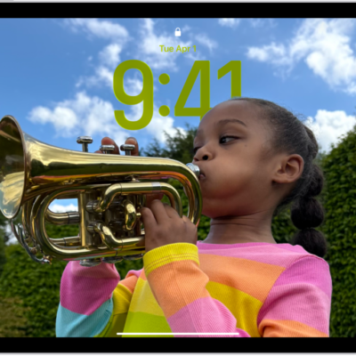 The iPad Lock Screen with a custom photo that fills the screen.