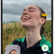 The FaceTime screen showing a call in progress. At the top of the screen is the name of the participant shown in the larger image. The other participant’s image appears in a small rectangle in the lower left, along with the Flip Camera button. The images of the other participants appear in tiles above it. Additional FaceTime controls are at the bottom right of the screen: Camera, Microphone, More, and End Call buttons.
