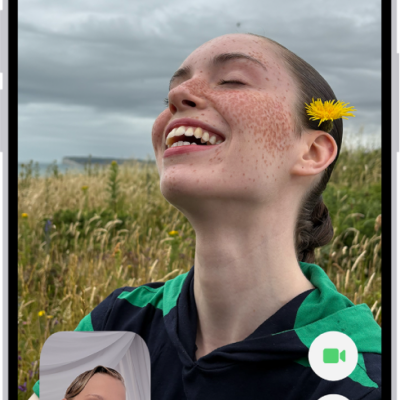 The FaceTime screen showing a call in progress. At the top of the screen is the name of the participant shown in the larger image. The other participant’s image appears in a small rectangle in the lower left, along with the Flip Camera button. The images of the other participants appear in tiles above it. Additional FaceTime controls are at the bottom right of the screen: Camera, Microphone, More, and End Call buttons.