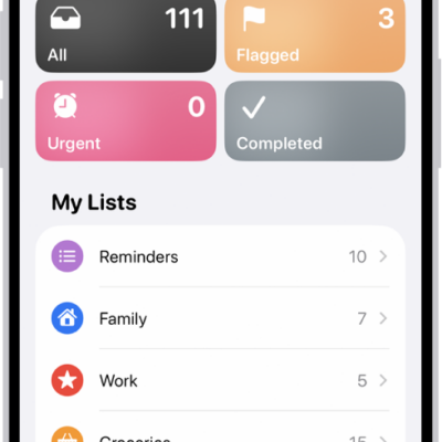 A Reminders screen showing a grid of Smart Lists, such as Today, Scheduled, and Flagged, each showing the number of items. Under the heading 'My Lists,' shows a list of custom reminder categories like Family, Work, and Camping Trip.