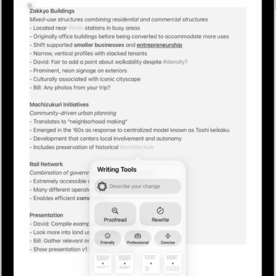 An iPad showing text in the Notes app. The Writing Tools window appears at the bottom of the screen.