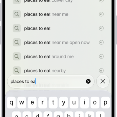 A Safari search screen, with the onscreen keyboard at the bottom of the screen. Above the keyboard, the search field contains text, and related search suggestions are listed above.
