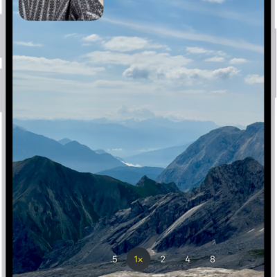 The Camera in Video mode recording a Dual Capture video. A window in the top-left of the frame displays what the front-facing camera is recording, and the rest of the frame displays what the back camera is recording.