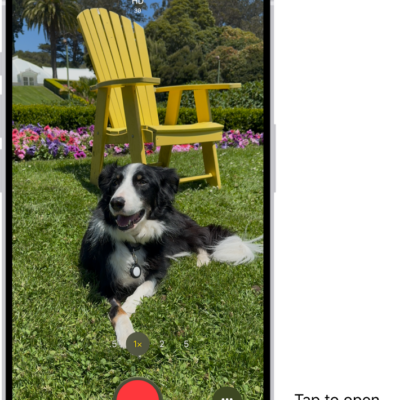 The Camera in Video mode. The Camera Controls button is in the top-right corner and the video format buttons are in the top-left corner. The Photo and Video Viewer button is in the bottom-left corner. The Record button is at the bottom center, and the Camera Chooser Back-Facing button is in the bottom-right corner.