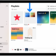 The Music app open on iPad with the sidebar on the left and the list of playlists on the right. At the top are buttons to create a new playlist or create a new folder. A blue arrow is pointing to a playlist folder named Roadtrips.