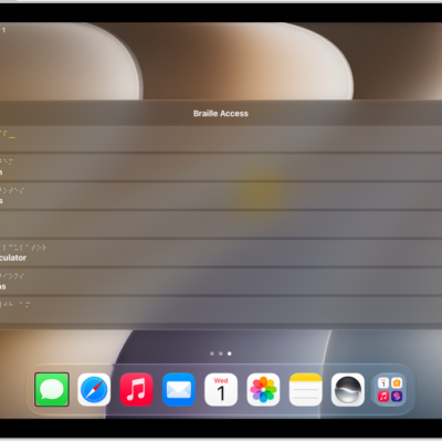 An iPad with the Braille Access menu open, showing the following options: Launch App, Choose Item, Braille Notes, BRF Files, UEB Calculator, Live Captions, and Time.
