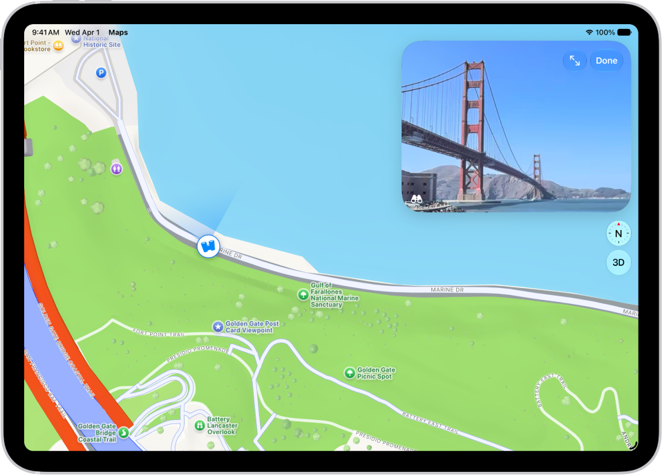 A moveable, 360-degree panoramic view appears above a map of the area marked in the Maps app. The Look Around icon overlaid on the map points in the direction of the view.